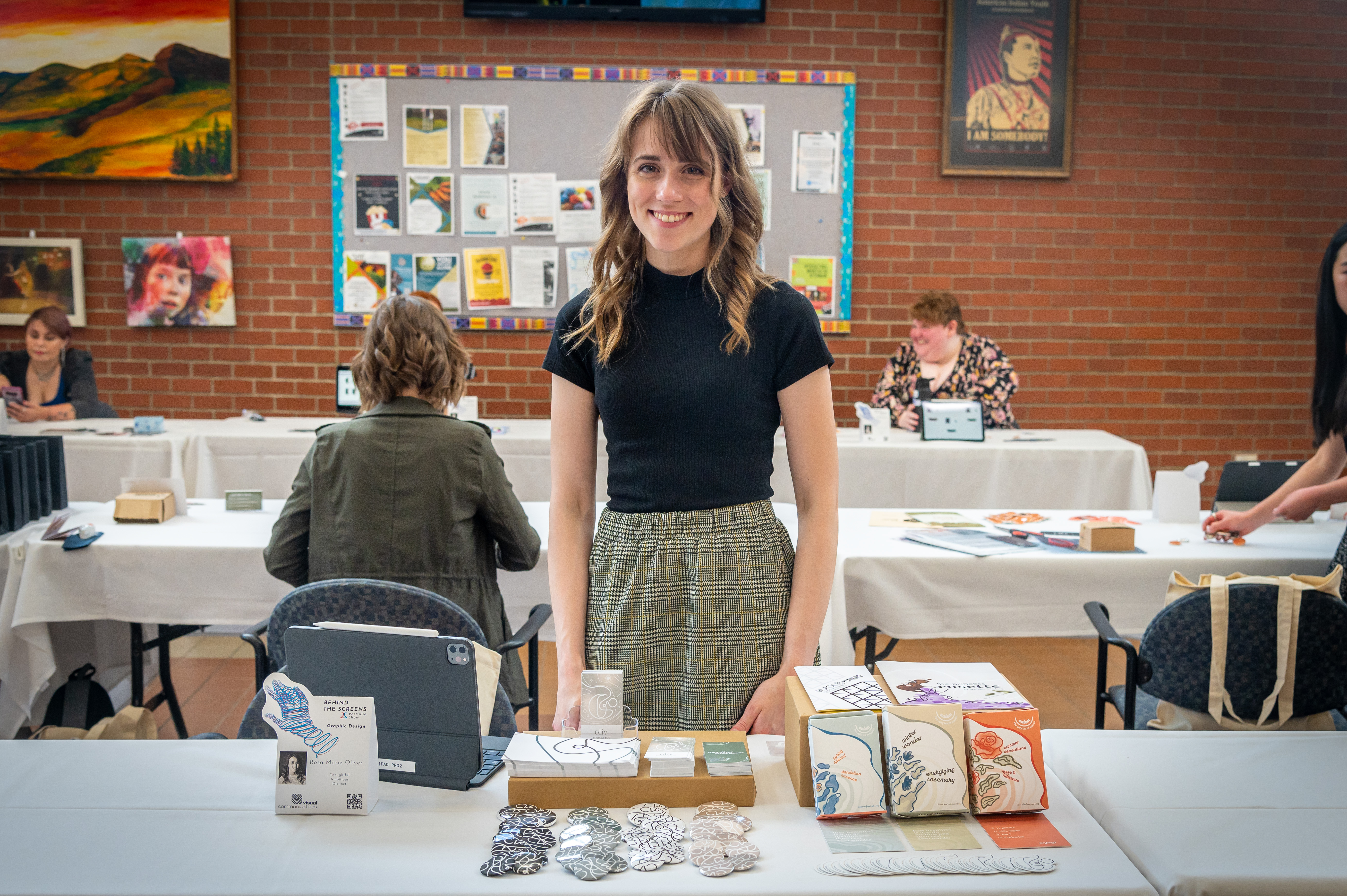 A Visual Communications student presenting their portfolio